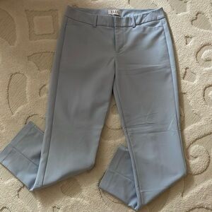 Elle ankle dress pants in a light blue/periwinkle color and pockets